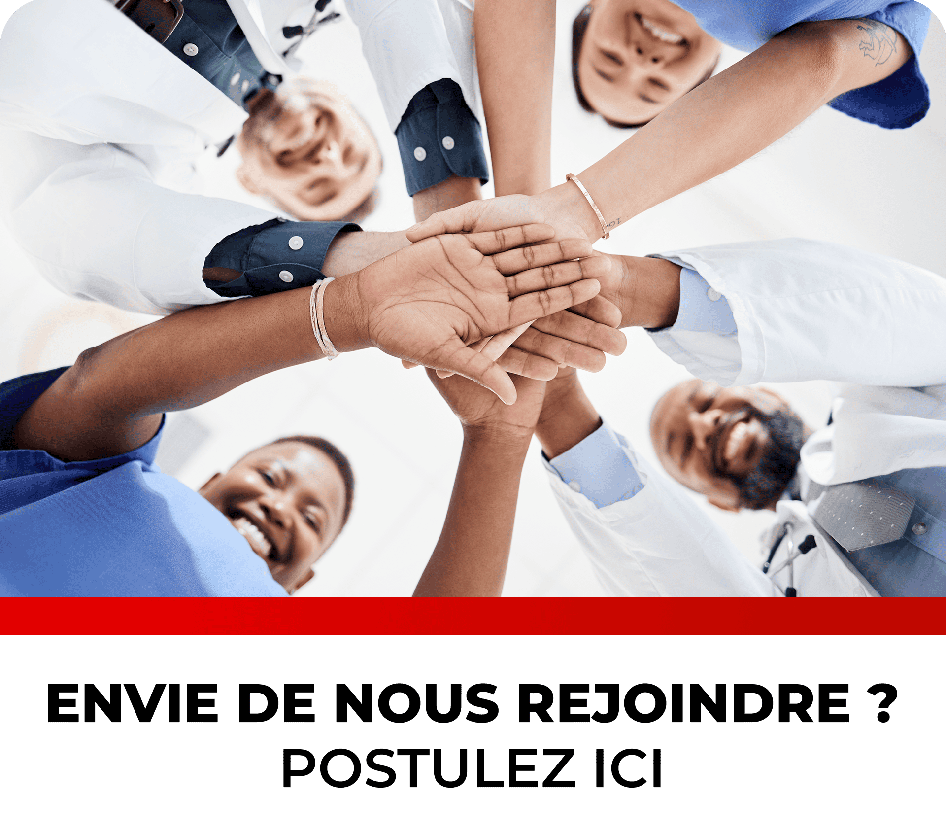 Group of medical professionals stacking hands in teamwork